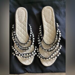 Chanel Black and White Crisscross Sandals with Pearl Embellishments
